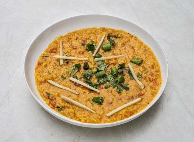 Daal moong masoor served in plate isolated on table top view of indian and pakistani spicy food