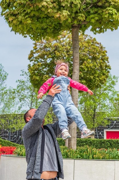 Dad and daughter Father plays with daughter