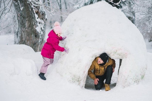 Dad and daughter hiding from each other