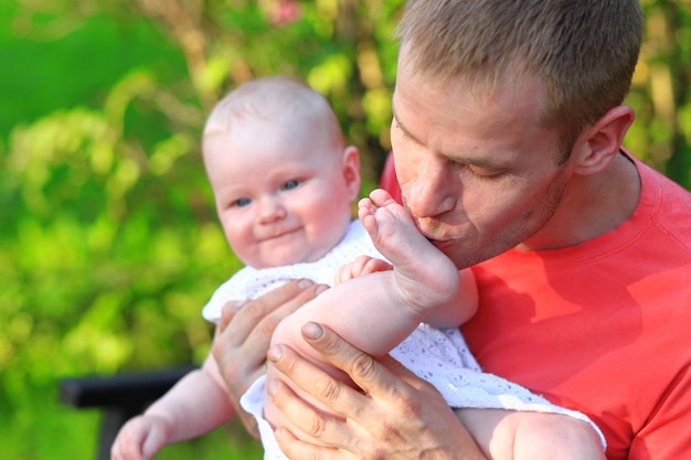 Dad and daughter in the park.