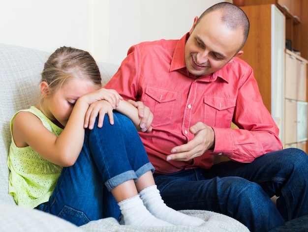 Dad giving instructions to child