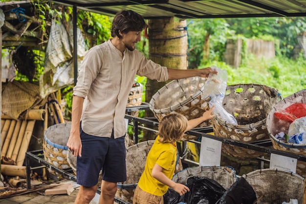 Dad and son separate garbage collection Teaching children to separate garbage collection