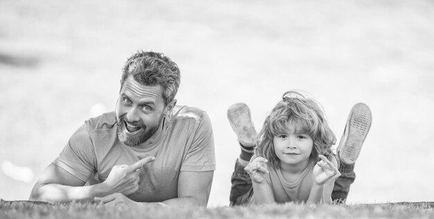 Photo dad with kid on summer day parenting and fatherhood fathers day