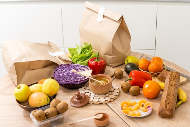 daily meals and snacks. Diet nutrition and brown paper bag package with copy space, Healthy food delivery from a restaurant, delicious food on the background of a paper bag package.