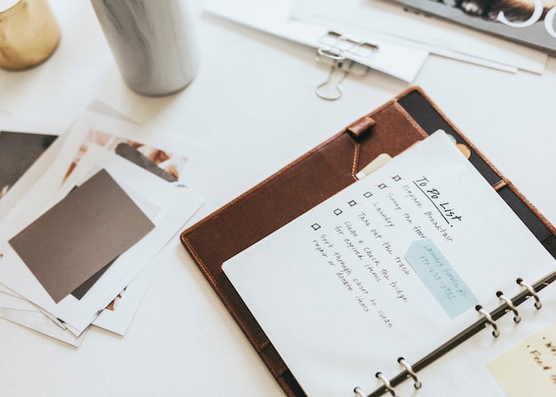 Daily planner on a messy desk