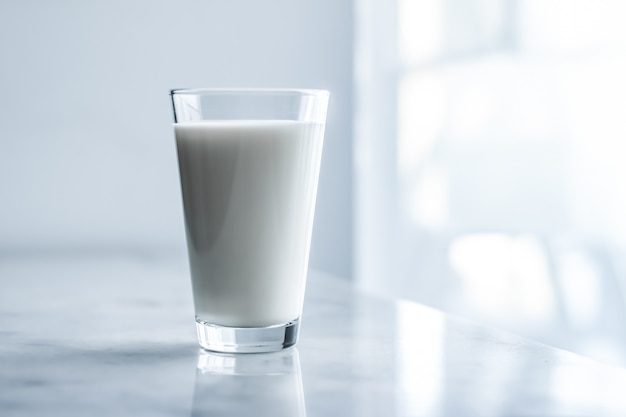 Dairy healthy nutrition and breakfast concept  world milk day full glass on marble table