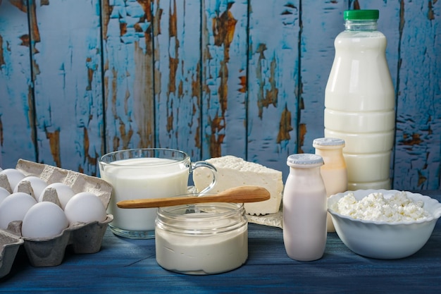 Photo dairy products on a blue table