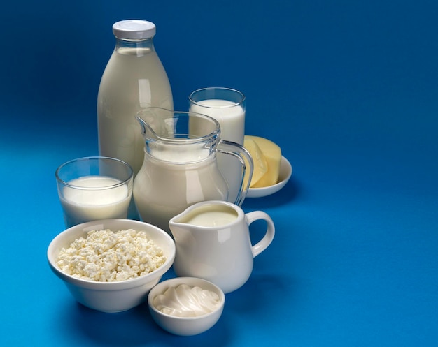 Dairy products on blue wooden background