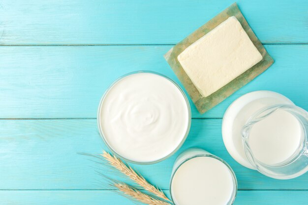 Dairy products on a blue wooden table