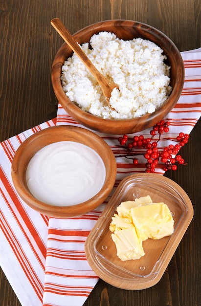 Dairy products on wooden table closeup