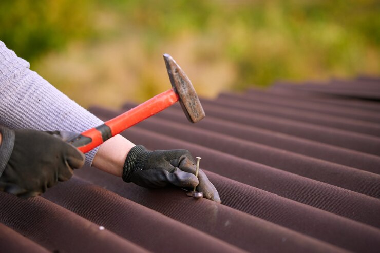 Dakreparatie met ondulin platen