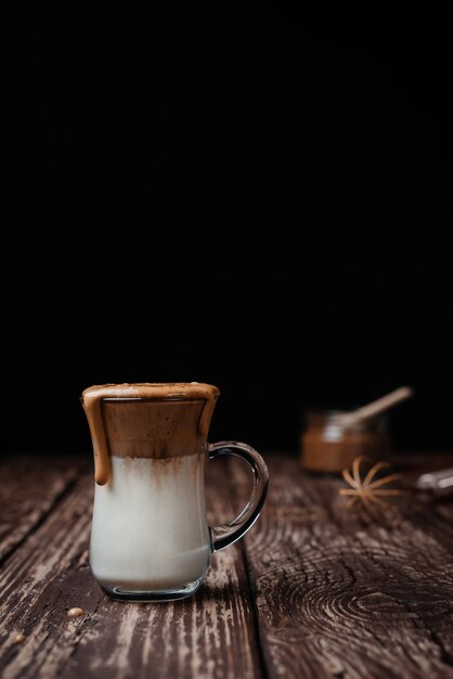 Dalgona iced coffee on neutral background