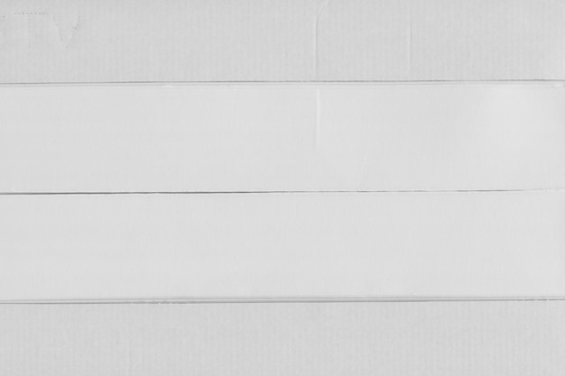 Фото Текстура упаковки поврежденной и гранжевой картонной бумаги