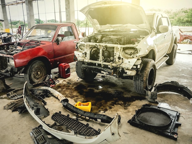 Damaged cars in garage