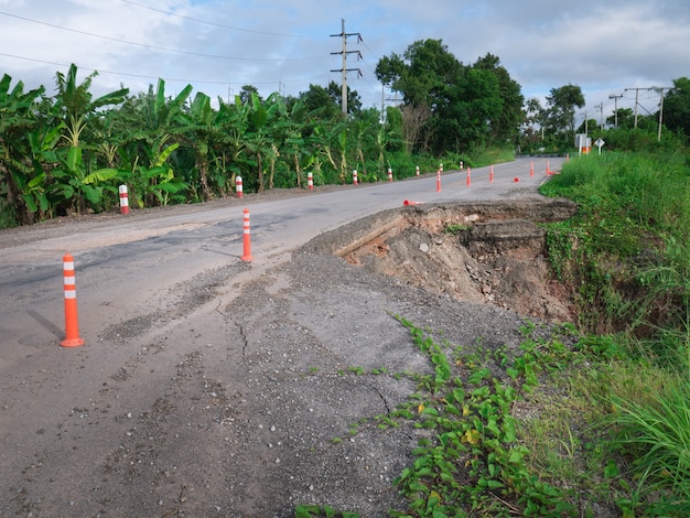 Damaged Highway road in country side on the high