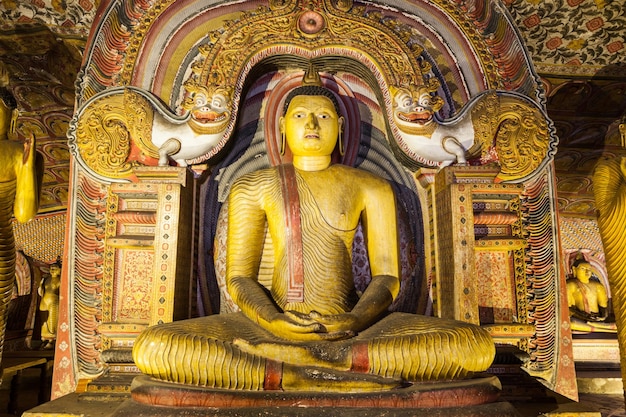 DAMBULLA, SRI LANKA - FEBRUARY 17, 2017: Buddha statues inside Dambulla Cave Temple. Cave Temple is a World Heritage Site near Dambulla city, Sri Lanka.