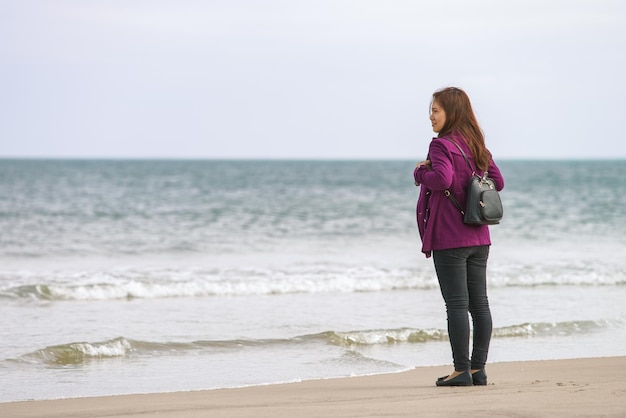 Danang, Vietnam - February 20, 2016: Young girl in the China Beach in Danang, in Vietnam.