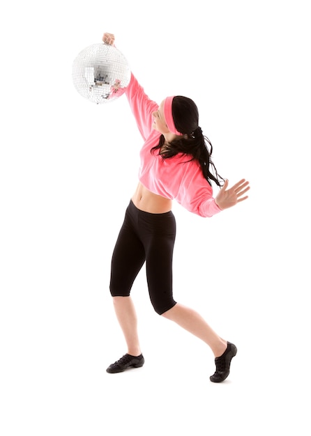 Photo dancer girl with glitterball over white