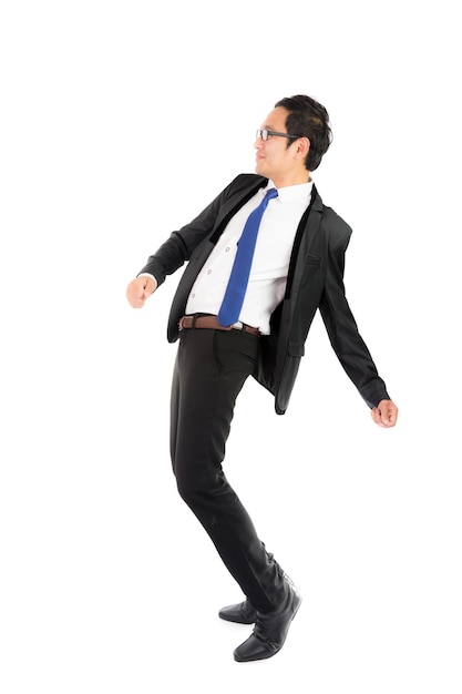 Dancing businessman isolated
