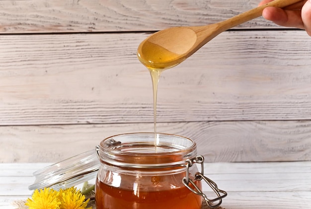 Dandelion jam in a glass jar The concept of health Life without cholesterol