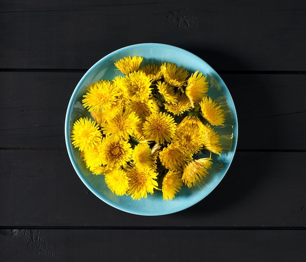 Dandelions on dark background