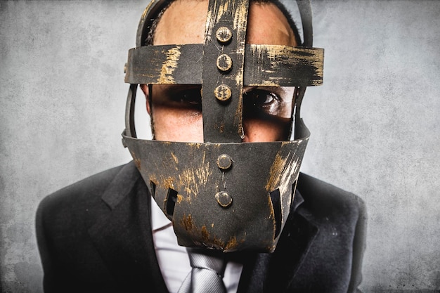 danger, dangerous business man with iron mask and expressions