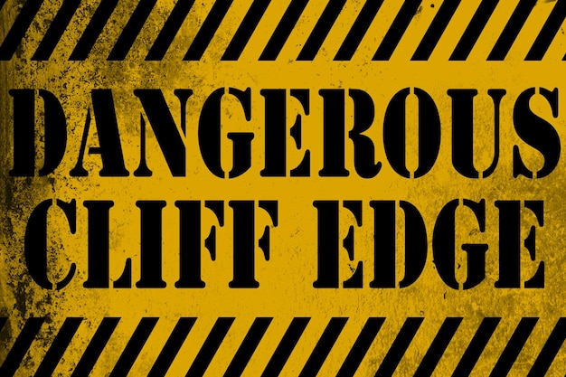 Dangerous cliff edge sign yellow with stripes