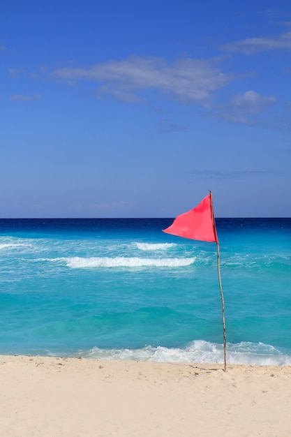 Dangerous red flag in beach rough sea signal