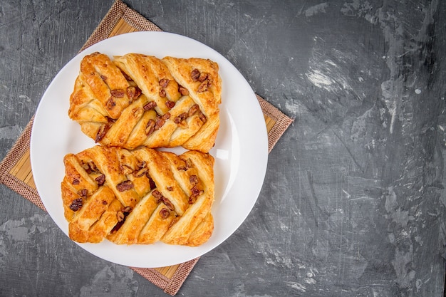 Danish pastry maple pecan with nuts and maple syrup