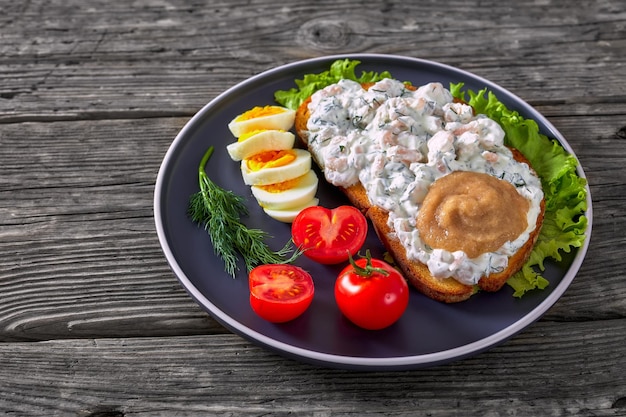 Danish smorrebrod with shrimps mayo roe and egg