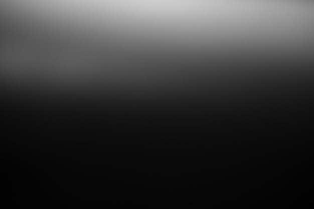 Photo dark black and gray blurred gradient background has a little abstract light