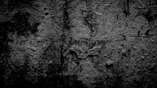 Dark black grunge cracked wall background