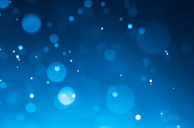 dark blue abstract backgrounds with bokeh.