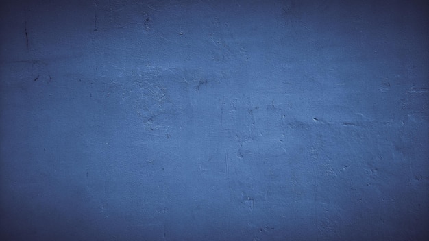 темно-синий абстрактный фон текстуры бетонной стены цемента.