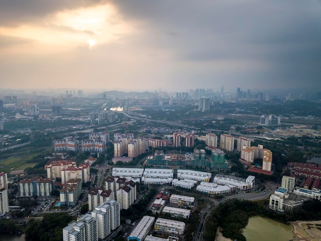 Dark blue cloud with white light sky background of the cityscape