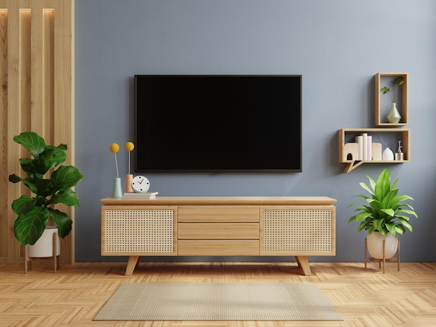 Sfondo della parete di colore blu scuro arredamento moderno del soggiorno con tv e cabinet3d rendering