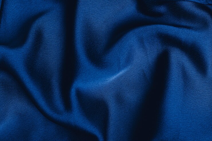 Photo dark blue fabric laid in soft folds
