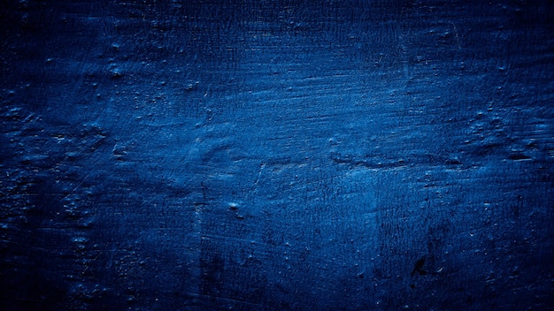 dark blue grungy abstract cement concrete wall texture background