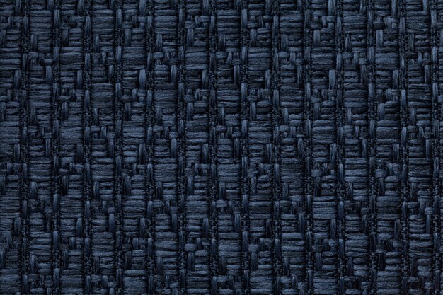 Photo dark blue knitted woolen background with a pattern