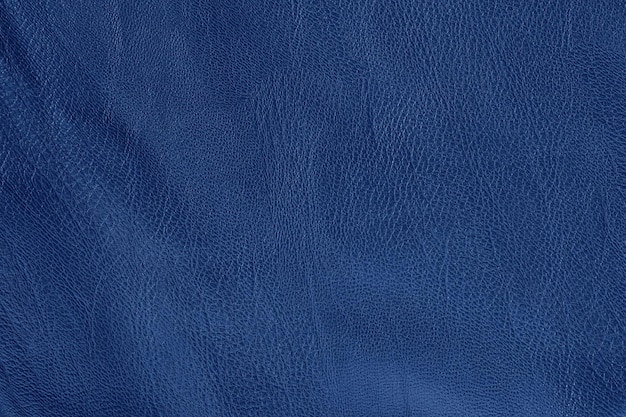 매끄러운 패턴과 높은 해상도를 가진 진한 파란색 가죽 질감 배경