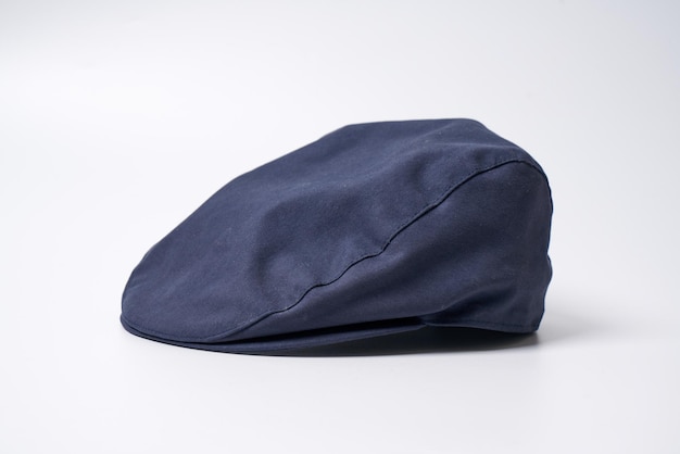 Dark blue mens hat on a white background