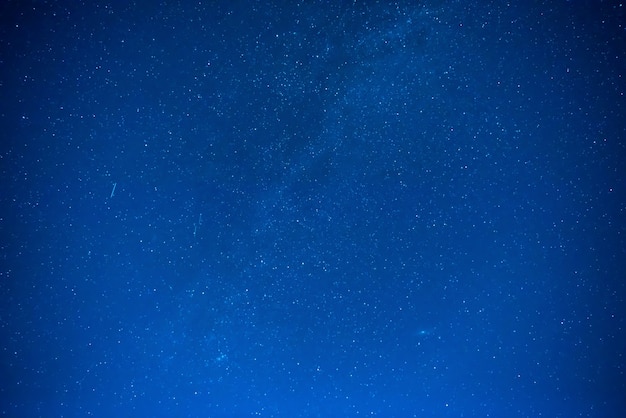 Premium Photo | Dark blue night sky with many stars, galaxy background