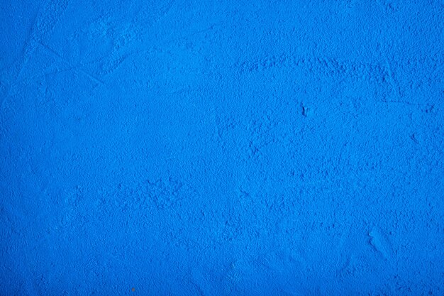 Dark blue porous concrete background