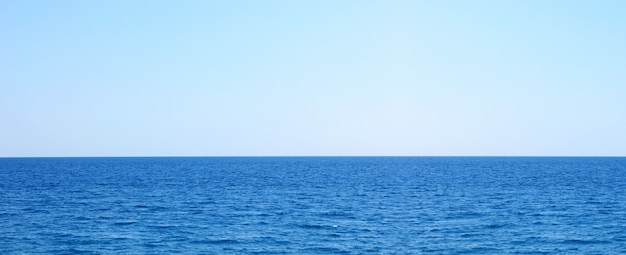 Dark blue sea and light blue sky