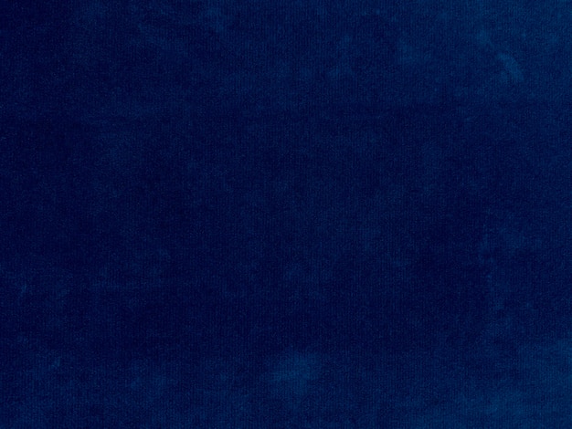 写真 背景として使用されるダークブルーのベルベット生地のテクスチャ柔らかく滑らかな繊維素材のスカイカラーパンネ生地の背景シルクの粉砕ベルベット高級コバルトトーン