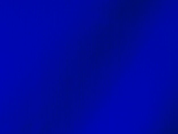 Dark blue velvet fabric texture used as background tone color blue cloth background of soft and smooth textile material there is space for text and for all types of design work