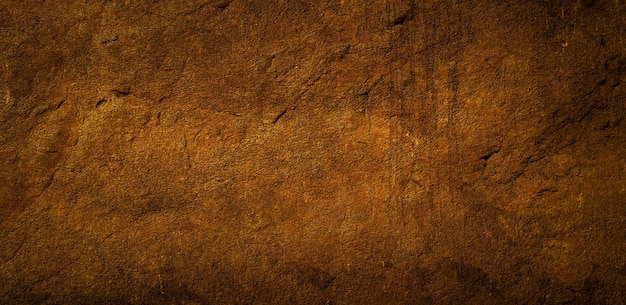 Dark brown black blur background stone wall grunge grain texture wallpaper