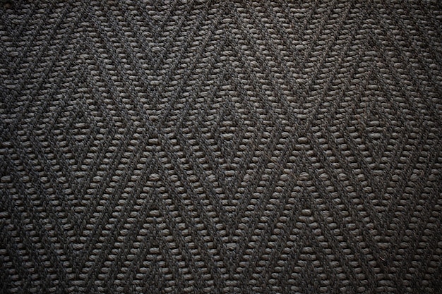 Dark brown carpet texture shot from above