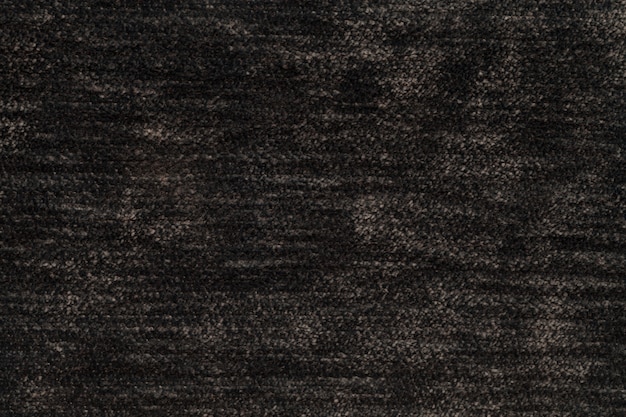 Dark brown fluffy background of soft, fleecy cloth, Texture of light nappy textile