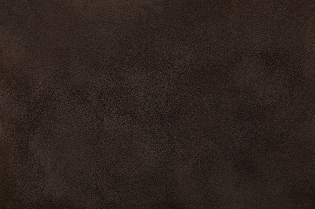 Dark brown matt suede fabric closeup